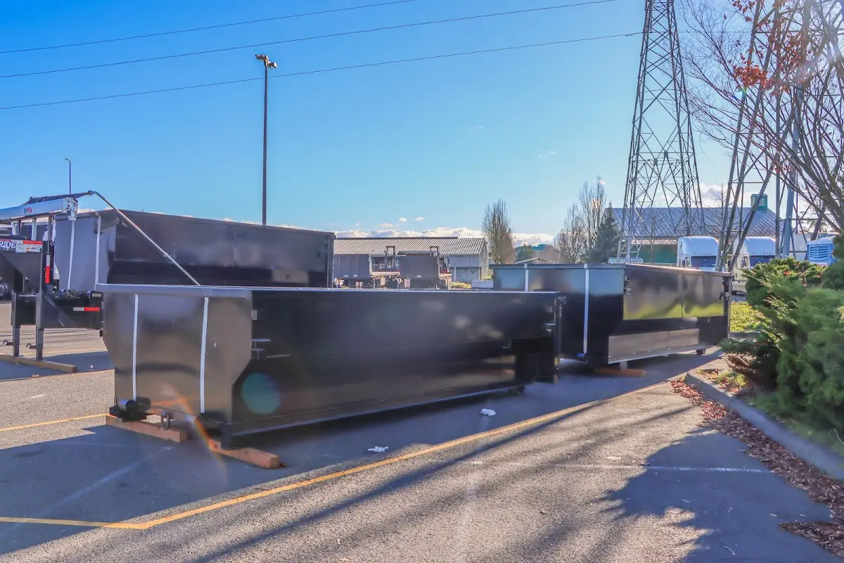 Roll-off dumpster ready for waste disposal at job site for 4 Yard Dumpster Rental in Manhattan